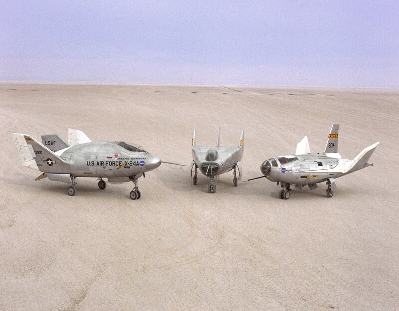 Three X-24A aircraft on a desert runway