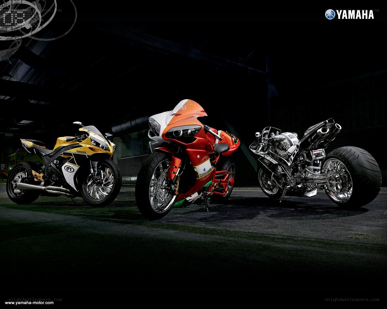 Three Yamaha motorcycles in a row