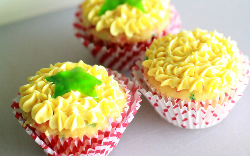 Three Yellow Cupcakes