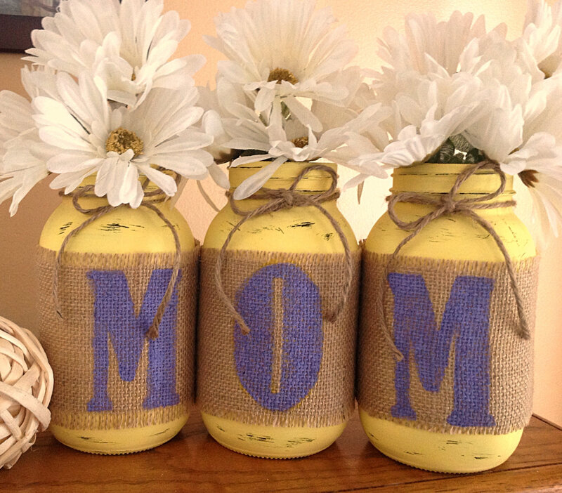 Three Yellow Jars with Flowers