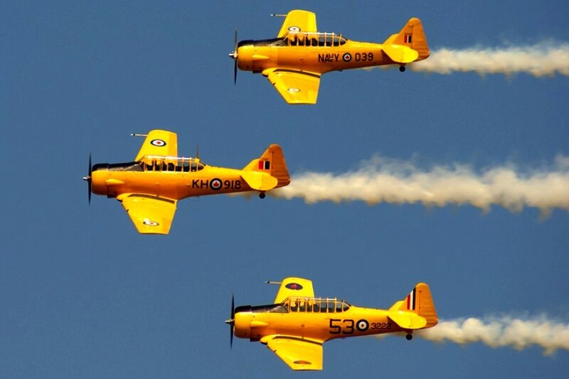 Three yellow planes in formation