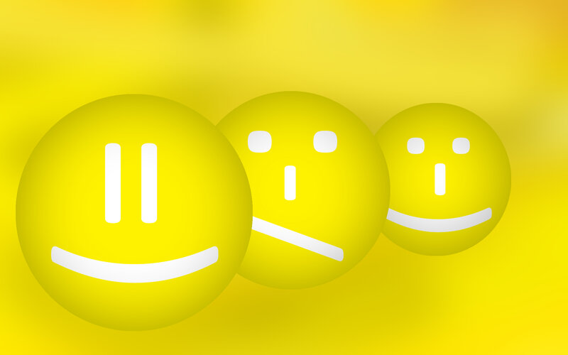 three yellow smiley faces