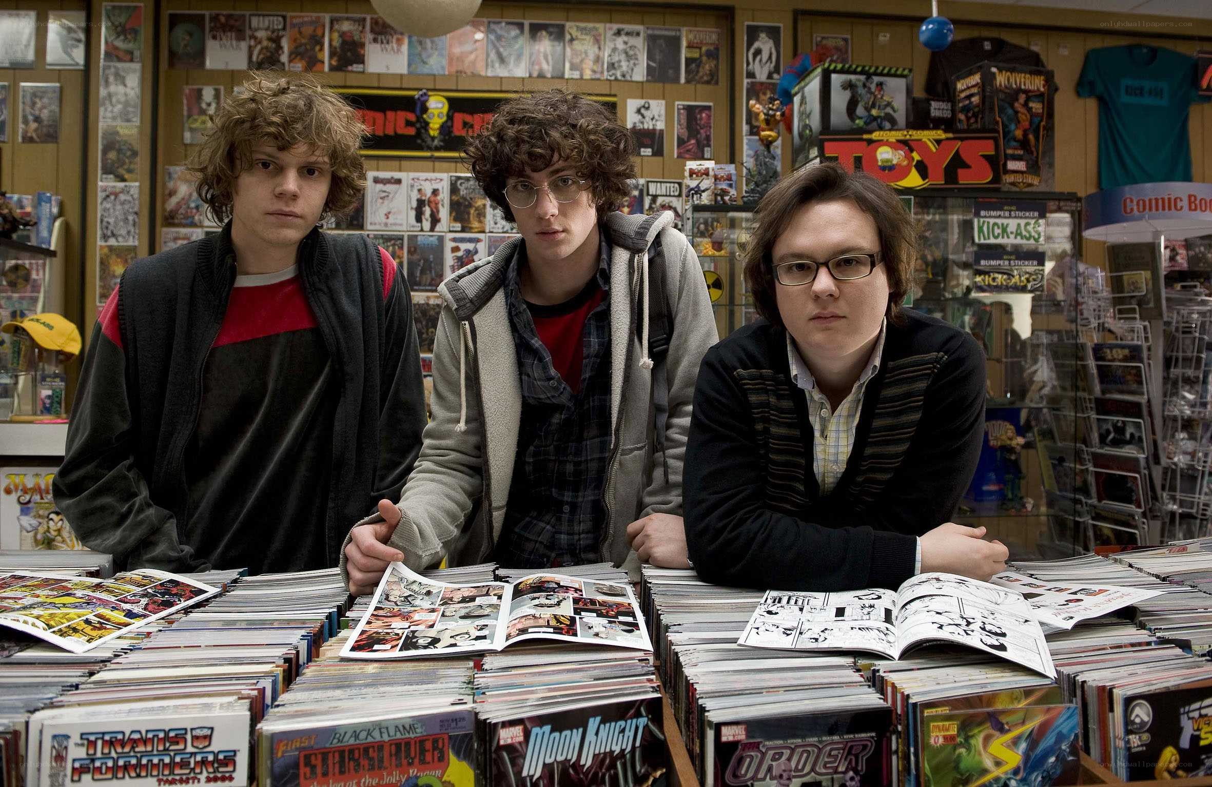 Three young men in a comic book store
