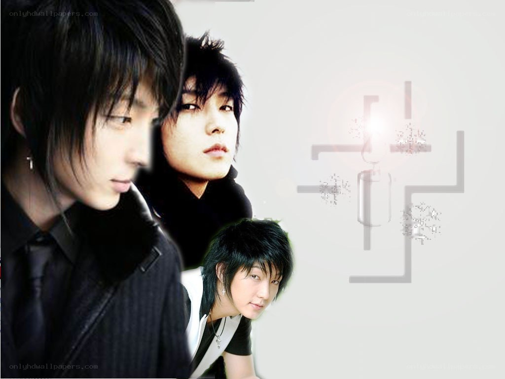 three young men in black clothing
