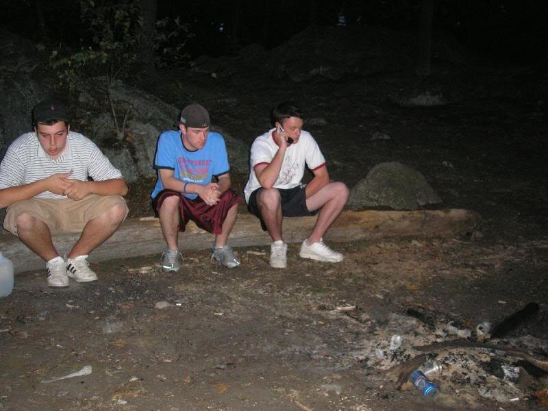 Three Young Men Sitting
