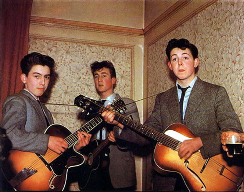 Three Young Men with Guitars