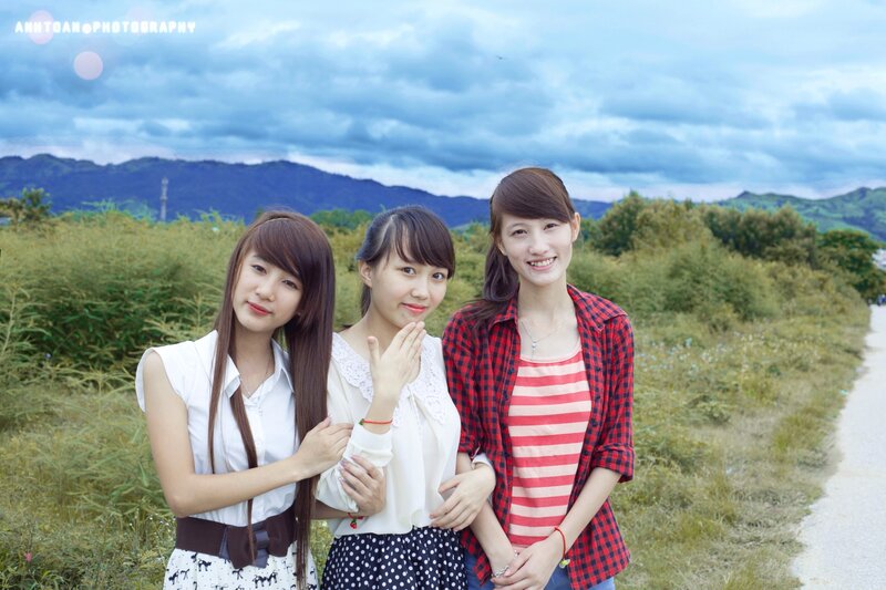 Three young women in a field