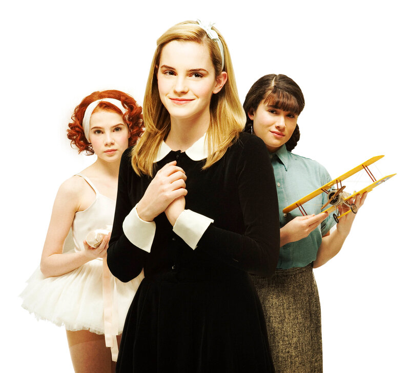 Three young women in vintage attire