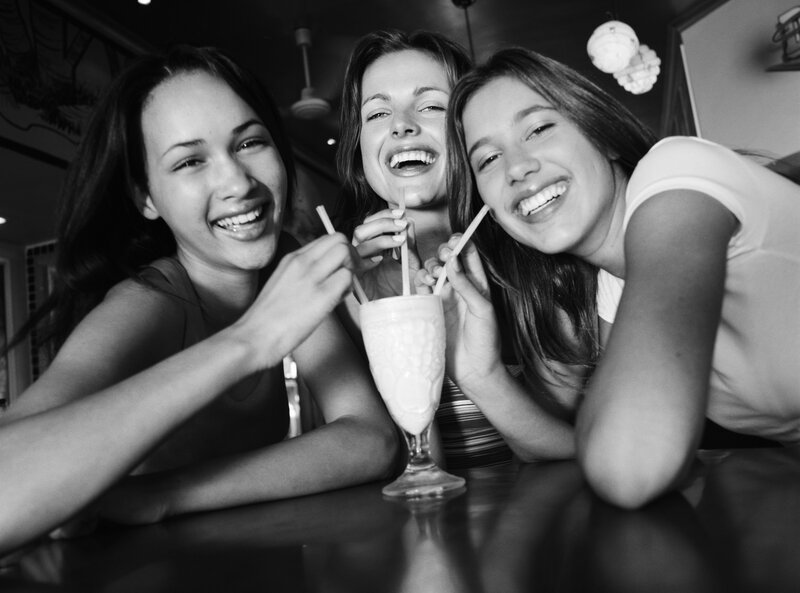 Three Young Women Laughing