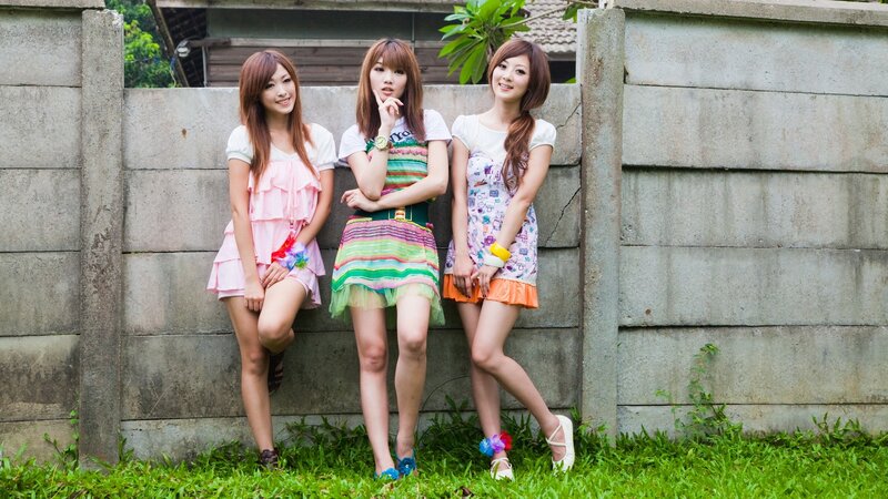 Three Young Women Posing — Green, Casual