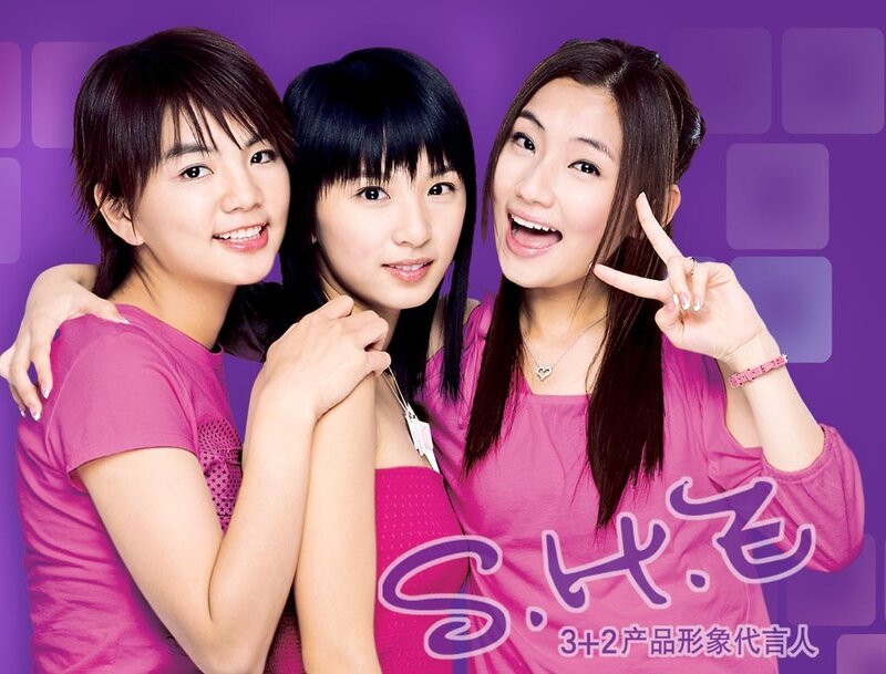 Three Young Women Posing — Purple, Cheerful