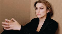 Actress Keira Knightley sitting