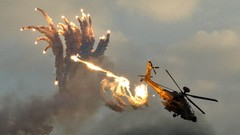 Aircraft smoke Helicopters military ah-64d apache flares skies 