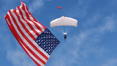 American flag blue sky