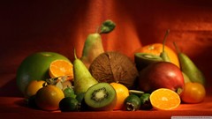 Apple oranges kiwi pear delicious fruits display