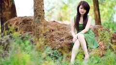 Asians girls in nature Viet Nam green dress