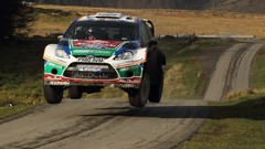 Asphalt Ford roads rally wales jumping racing wrc racing cars 