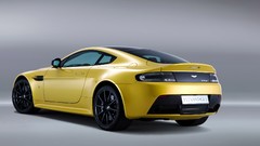 Aston vehicles 2014 grey background v12 vantage rear angle view 