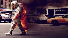astronaut fire humor spacesuit USA smoke traffic road City burn