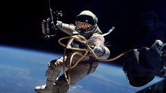 Astronauts float outer space