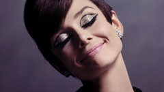 Audrey Hepburn smiling closed