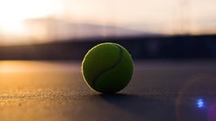 Balls sunlight lens flare depth of field tennis balls