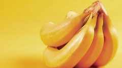 Bananas yellow background colors Vitamins fruits fresh strong