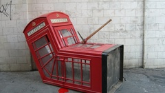 Banksy phone booth English