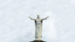 Batman Jesus Christ statues