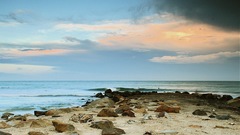 Beach rocks Sea clouds