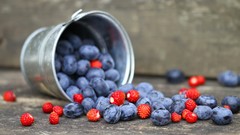 Berries blueberries bucket strawberries fruits depth of field