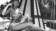 Bettie Page smiling greyscale