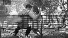 Black and white bench Parks lovers kissing