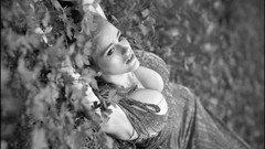 Black and white brunettes lying down