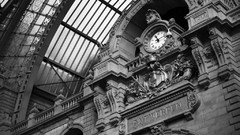 Black and white buildings clocks