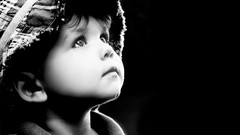 Black and white children boy black background grayscale