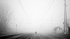 Black and white roads railroad tracks