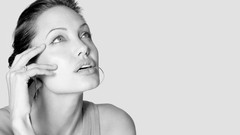 Black and white woman Angelina Jolie faces Actress
