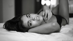 Black and white woman chest beds faces legs bra