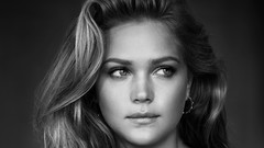 Black and white woman close-up faces monochrome earrings 