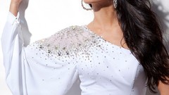 Black and white woman earrings bracelets long hair white dress 