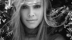 Black and white woman faces Kristanna Loken
