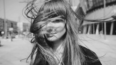 Black and white woman hair in face