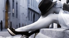 Black and white woman monochrome legs high heels selective 