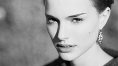 Black and white woman Natalie Portman faces ear rings