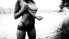 Black and white woman tattoos brunettes
