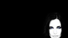 Black background Celebrity Courteney Cox blue eyes selective 