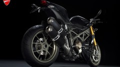 Black background Ducati motorbikes