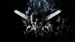 Black background skulls chainsaw
