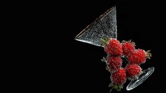 Black background strawberries